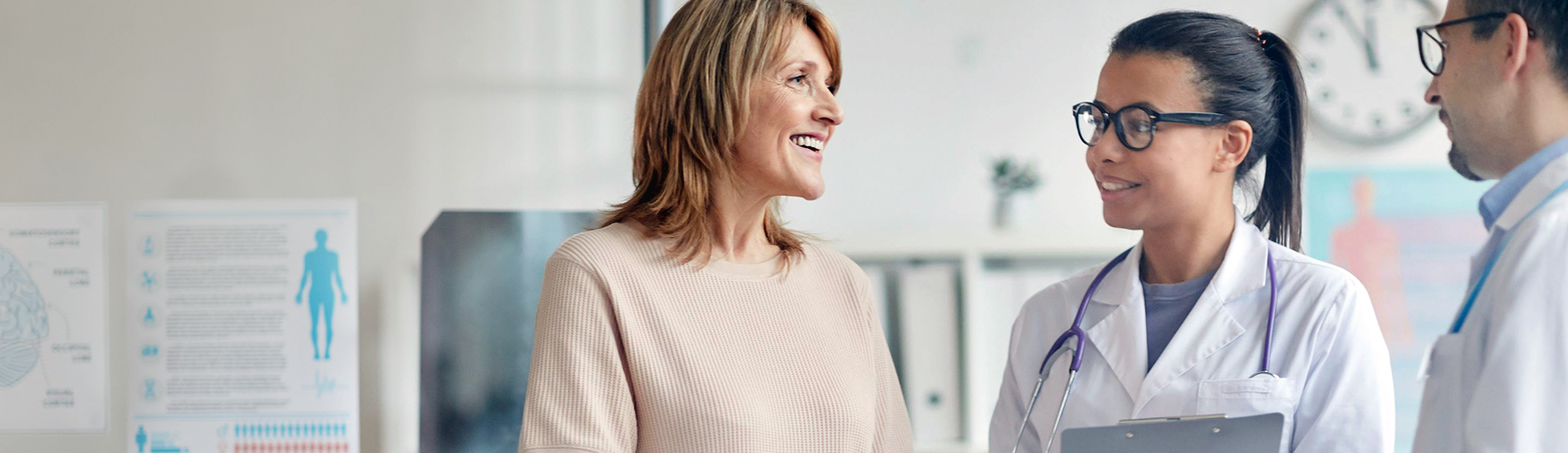 photograph of doctor in an office talking to a patient